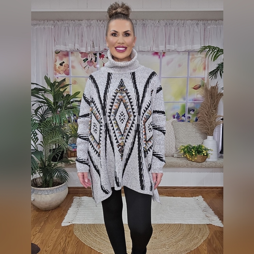 A Tunic Length Turtleneck Sweater